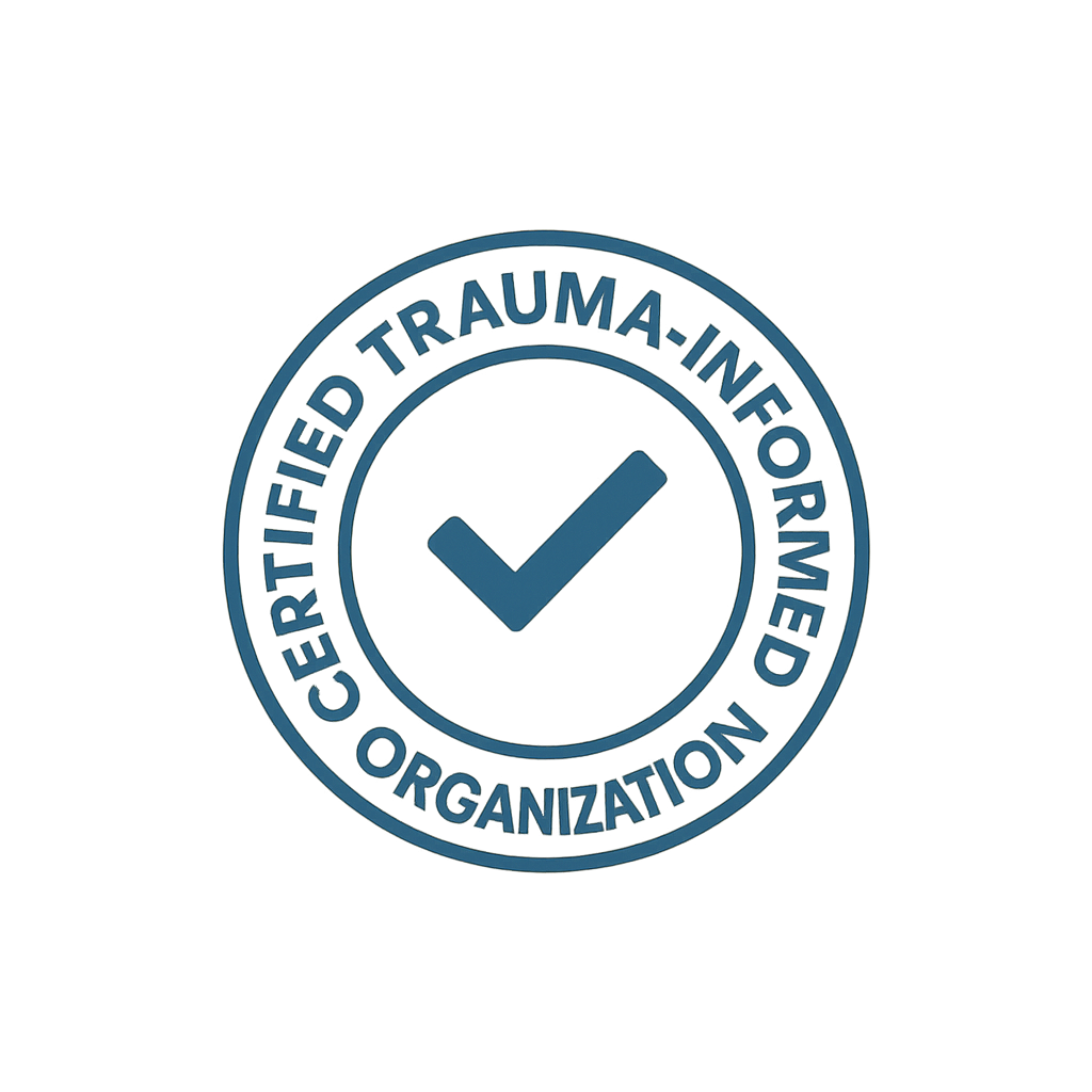 Certified Trauma-Informed Organization badge in navy blue with checkmark seal, representing SafeBonds’ trauma-informed credibility and professionalism.